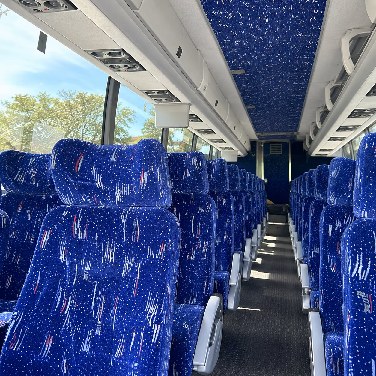 flint charter bus rental interior