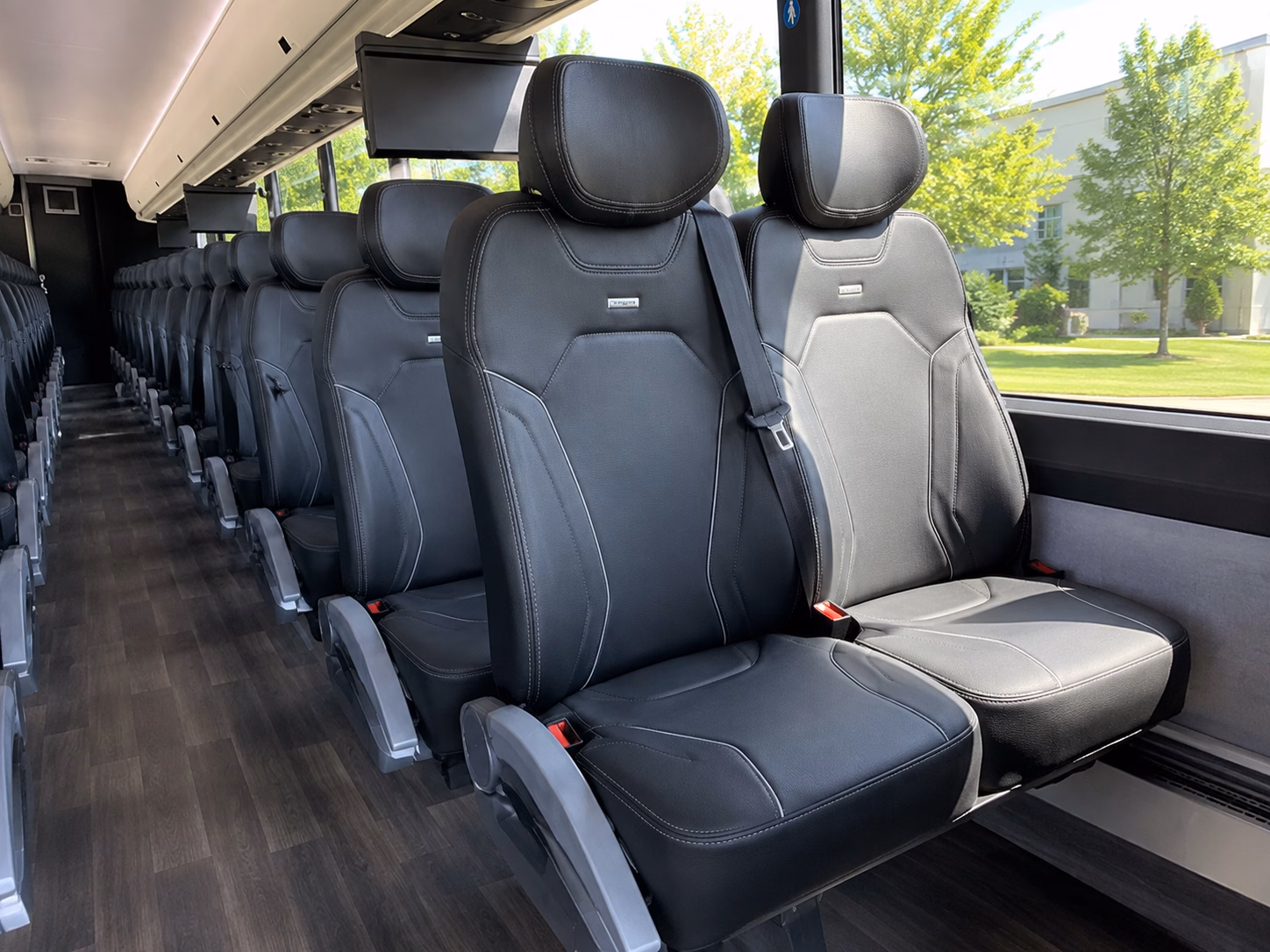 how seasonality and peak times affect charter bus rates in flint michigan