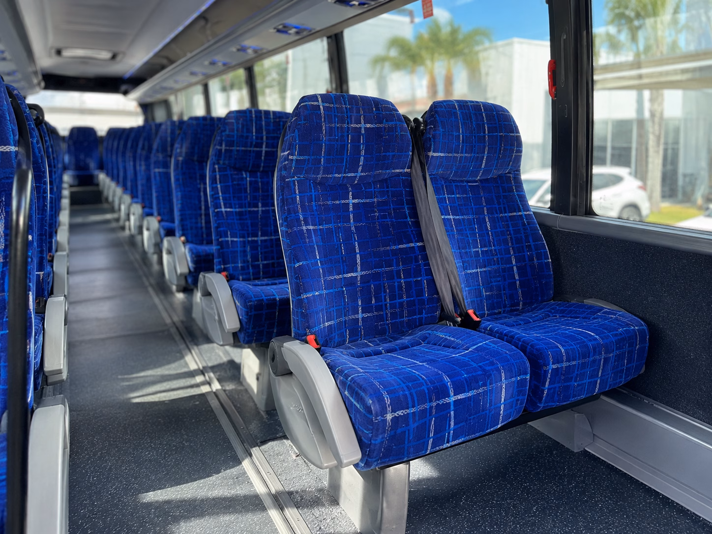how starting location and deadhead affect charter bus rates in flint michigan
